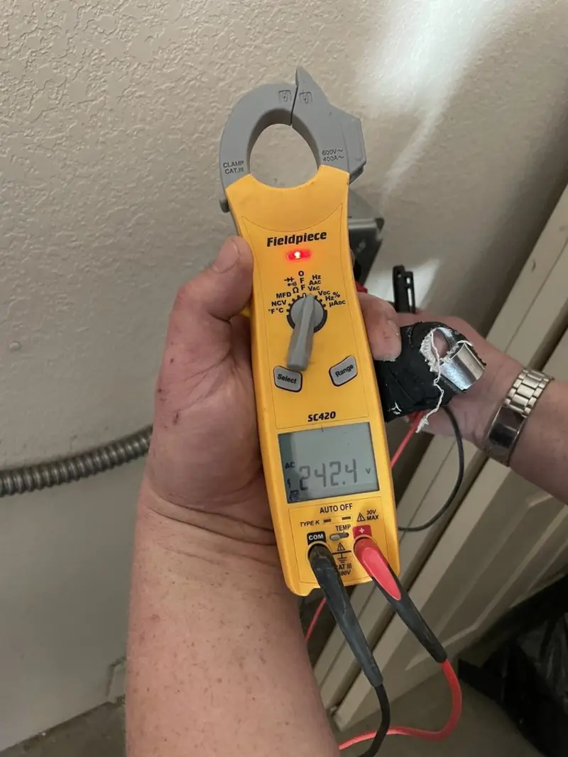 Voltage testing with clamp meter during Hot Tub / Pool Electrical Wiring in Warr Acres